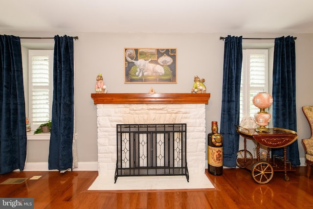 interior space featuring a fireplace and hardwood / wood-style floors