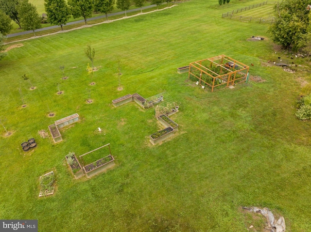 birds eye view of property featuring a rural view