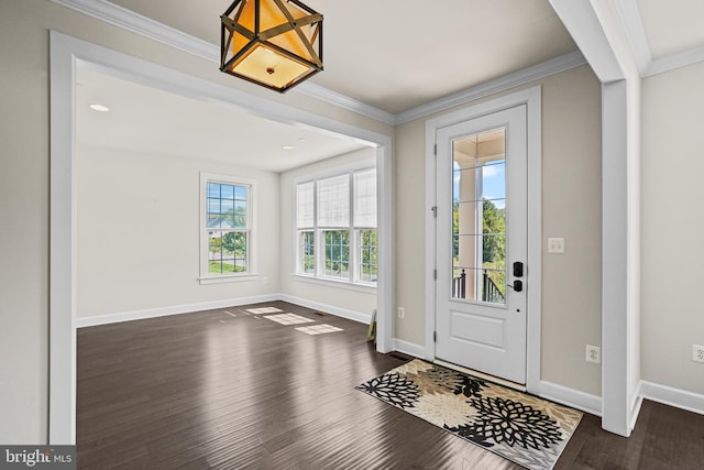 entryway featuring dark hardwood / wood-style floors and ornamental molding