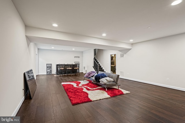 workout room featuring dark hardwood / wood-style floors