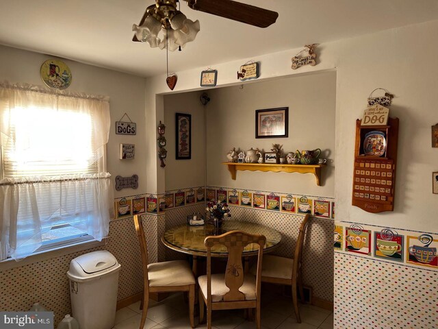 bedroom with cooling unit, ceiling fan, and wood-type flooring