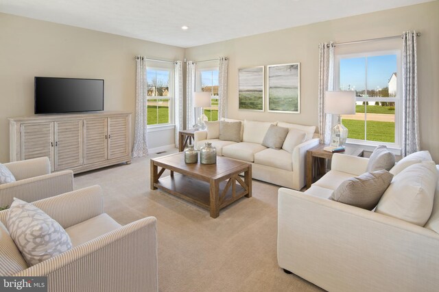 carpeted living room featuring a wealth of natural light