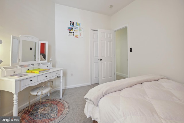 carpeted bedroom with a closet