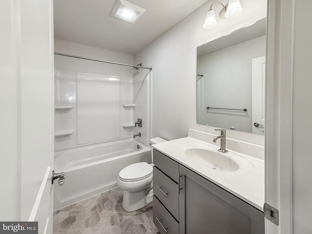 bathroom with washtub / shower combination, toilet, and vanity