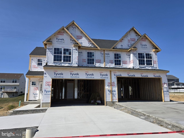 property in mid-construction featuring a garage