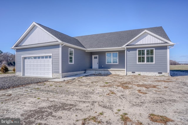 ranch-style house with a shingled roof, an attached garage, board and batten siding, and crawl space