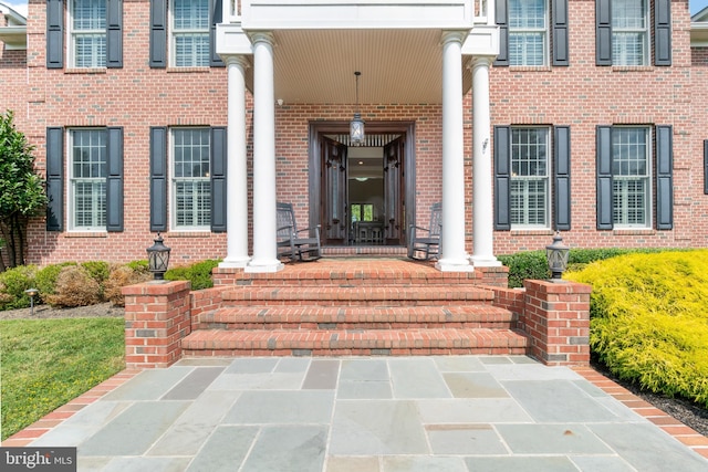 entrance to property with covered porch