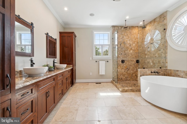 bathroom with tile patterned flooring, vanity, separate shower and tub, and ornamental molding