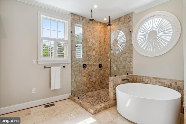 bathroom featuring crown molding, separate shower and tub, and tile patterned flooring