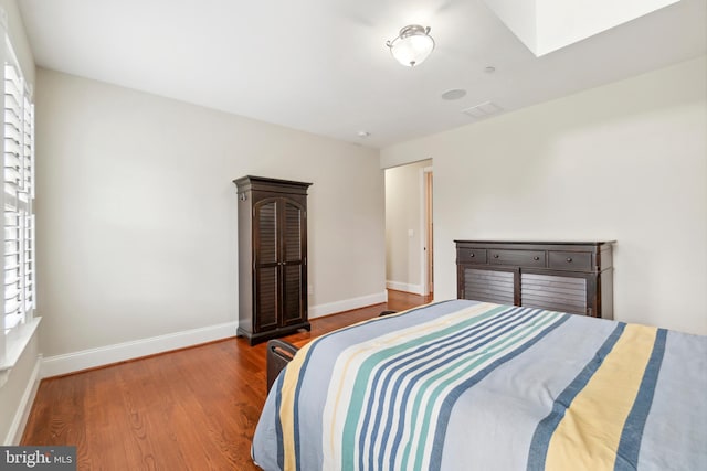 bedroom featuring hardwood / wood-style flooring