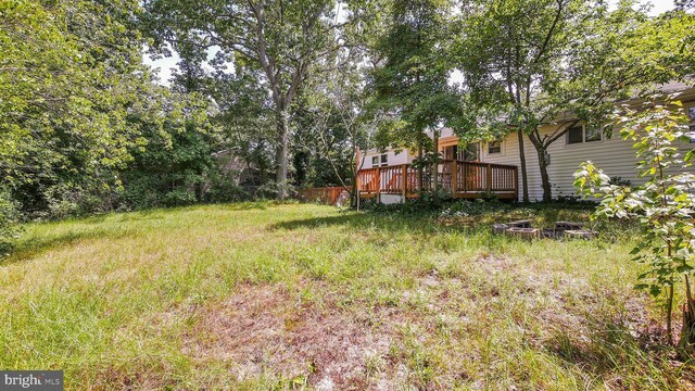 view of yard featuring a deck