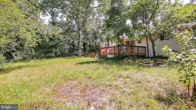 view of yard featuring a deck