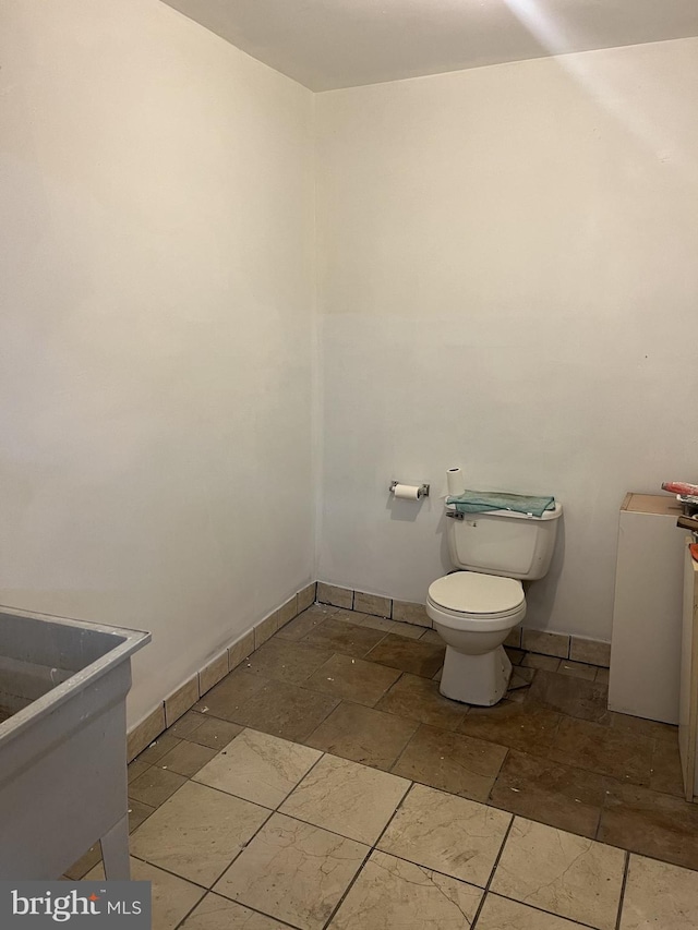 bathroom featuring toilet