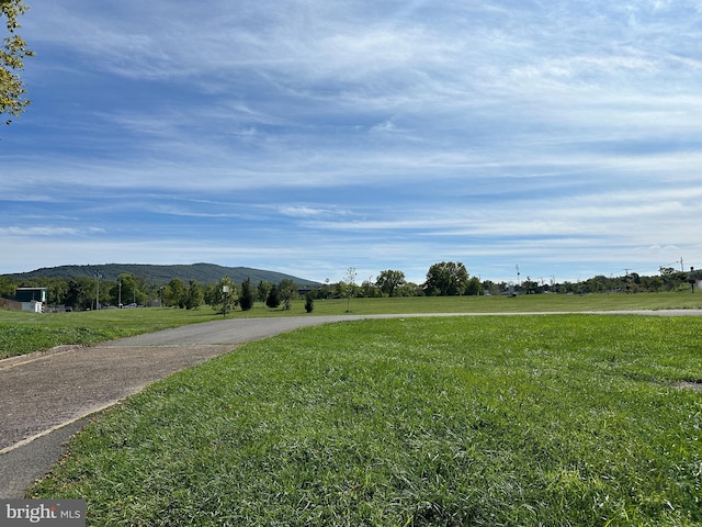 view of street featuring a mountain view and a rural view