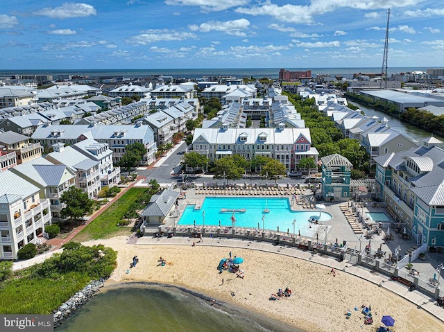 birds eye view of property featuring a water view