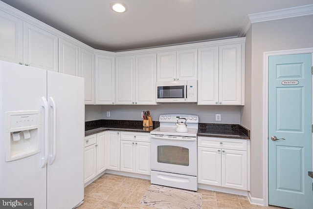 kitchen featuring white appliances, white cabinetry, and ornamental molding