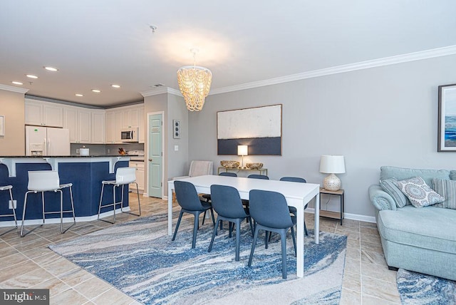 dining area with ornamental molding and a notable chandelier