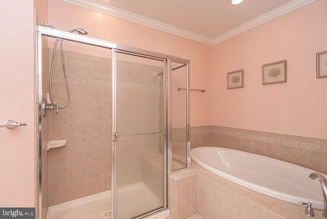 bathroom featuring shower with separate bathtub and ornamental molding