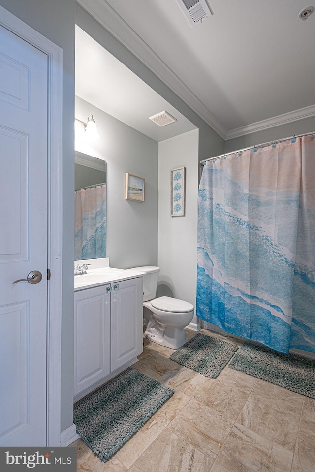 bathroom with crown molding, vanity, toilet, and a shower with shower curtain