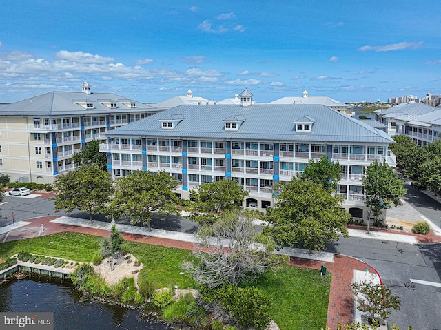 view of building exterior with a water view