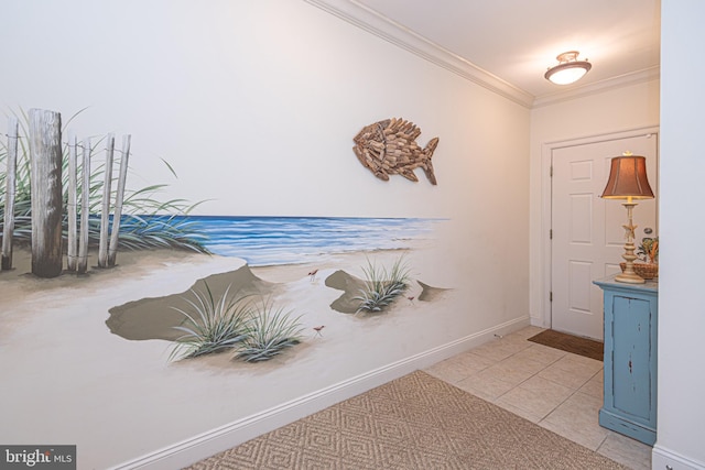 entryway with crown molding, baseboards, and tile patterned floors