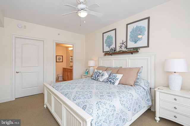 carpeted bedroom featuring ceiling fan and connected bathroom