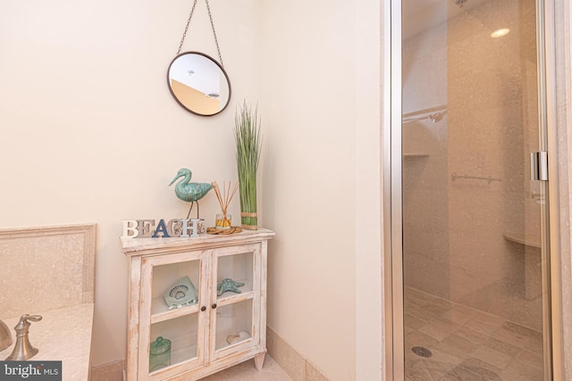 full bath featuring a shower stall