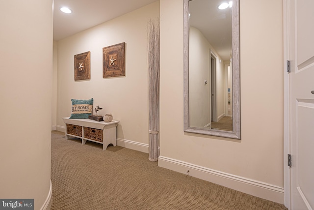 corridor featuring recessed lighting, baseboards, and carpet floors