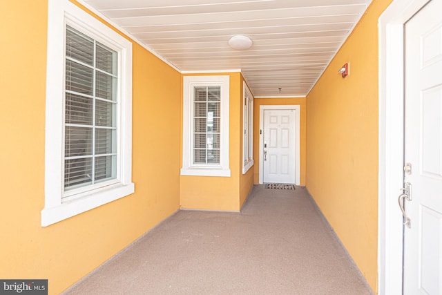 property entrance featuring stucco siding