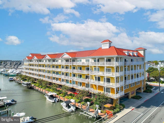 view of building exterior featuring a water view