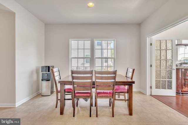 dining room with light hardwood / wood-style flooring