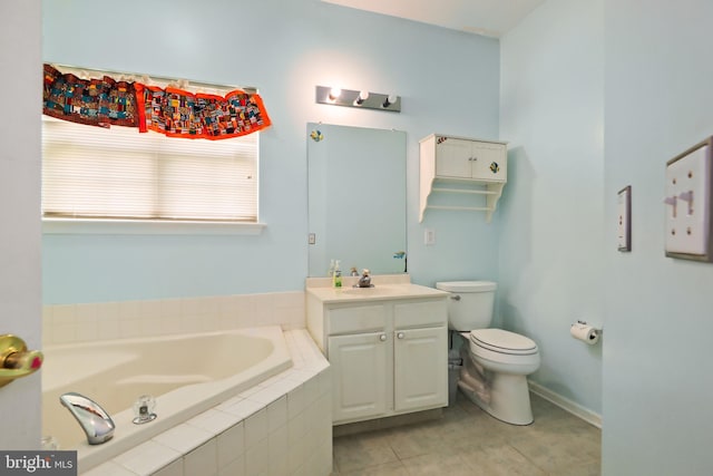 bathroom with tile patterned floors, toilet, tiled tub, and vanity