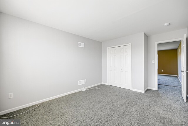 unfurnished bedroom with carpet floors