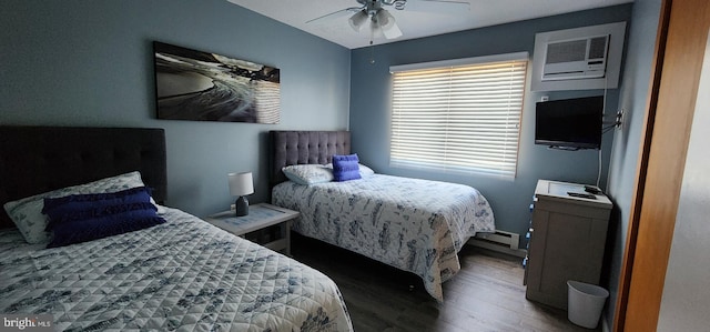 bedroom with baseboard heating, ceiling fan, and hardwood / wood-style flooring