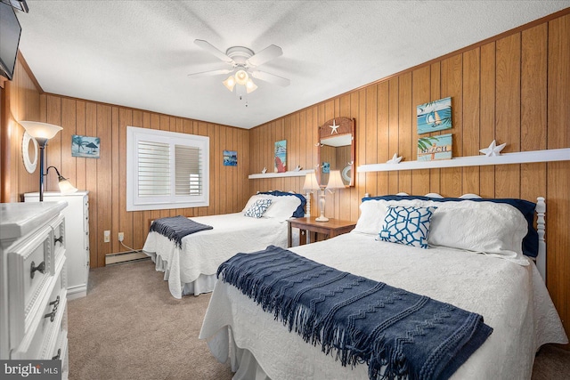 bedroom with a baseboard radiator, light colored carpet, ceiling fan, and a textured ceiling