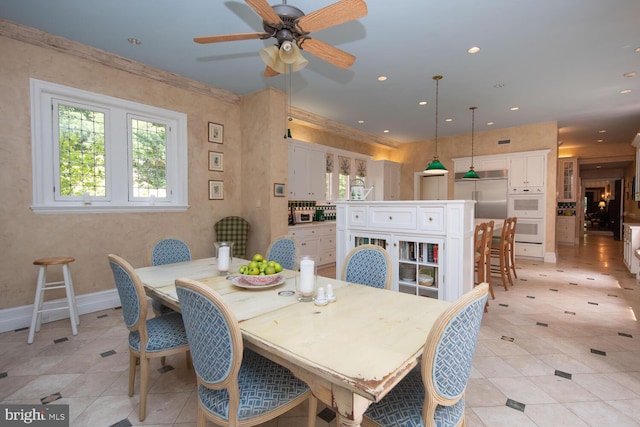 dining area featuring recessed lighting, baseboards, and ceiling fan