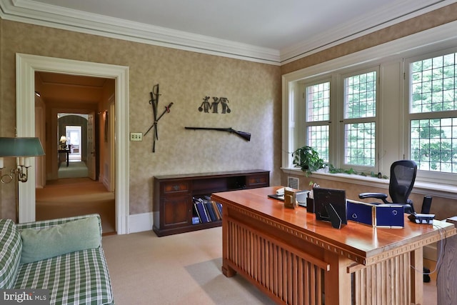 office area featuring baseboards, light colored carpet, ornamental molding, and wallpapered walls