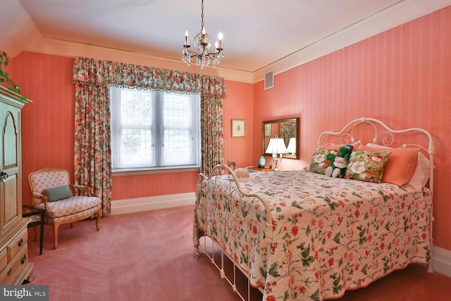 bedroom with visible vents, a notable chandelier, carpet flooring, crown molding, and baseboards