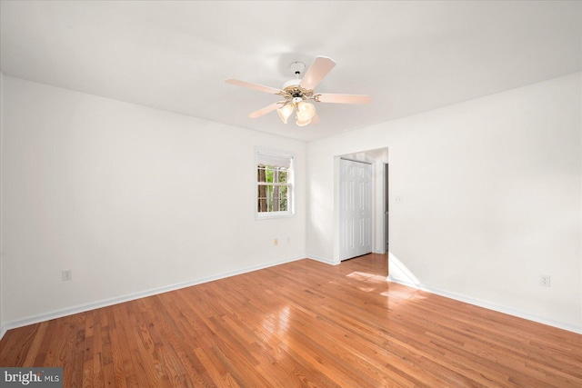 unfurnished room with light hardwood / wood-style flooring and ceiling fan