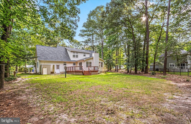 view of yard featuring a wooden deck