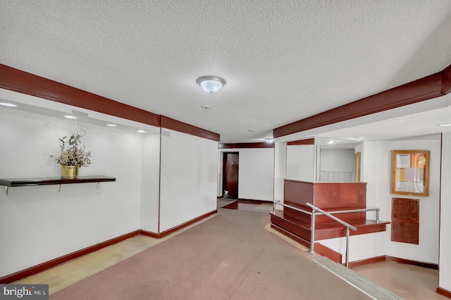 interior space featuring a textured ceiling