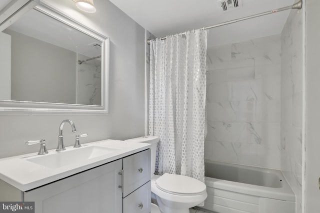 full bathroom with vanity, toilet, and shower / bath combo with shower curtain