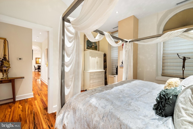 bedroom featuring hardwood / wood-style floors