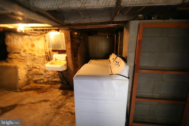 361 Ridgley, Orbisonia, PA 17243 - unfinished below grade area with a sink and washing machine and dryer