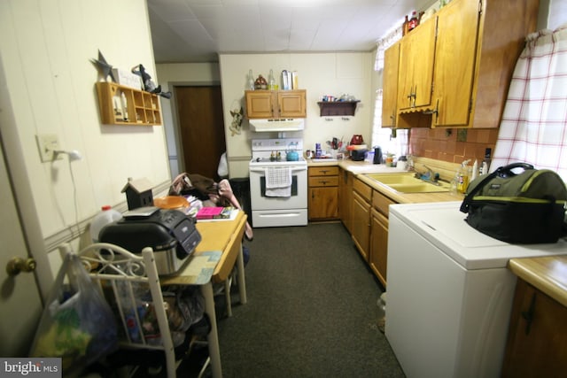 361 Ridgley, Orbisonia, PA 17243 - kitchen with under cabinet range hood, a sink, washer / dryer, white electric stove, and brown cabinetry