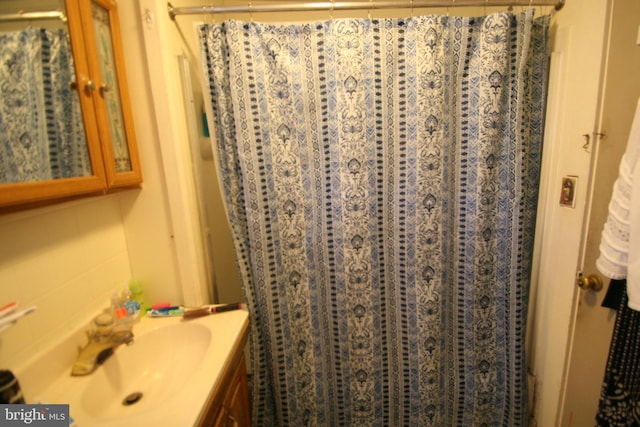 361 Ridgley, Orbisonia, PA 17243 - full bath featuring a shower with shower curtain and vanity