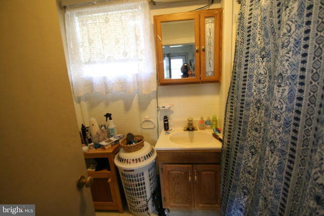 361 Ridgley, Orbisonia, PA 17243 - bathroom with tile walls, curtained shower, and vanity