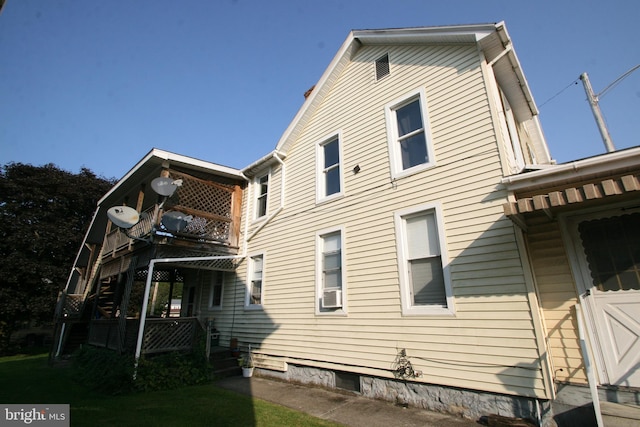361 Ridgley, Orbisonia, PA 17243 - view of side of property with cooling unit and a balcony