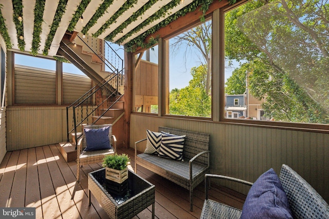 sunroom / solarium featuring plenty of natural light