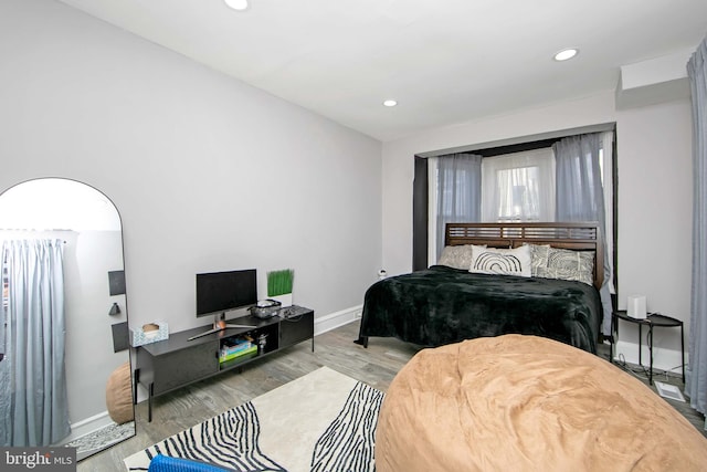 bedroom featuring light hardwood / wood-style floors